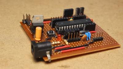 How to Make Your Own ARDUINO UNO Board ( Breadboard - Veroboard - Programming )