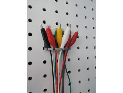 Peg board round cable holder