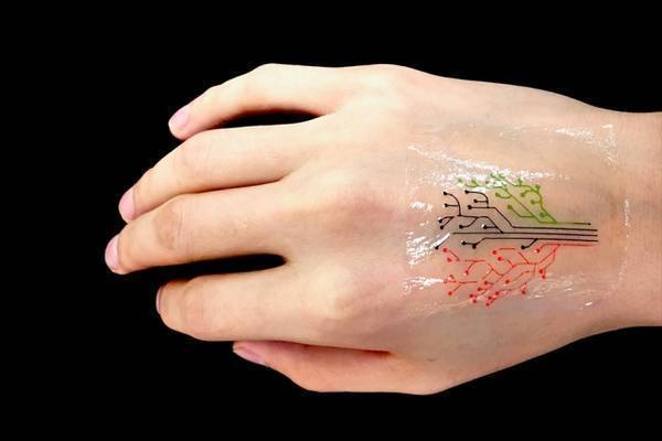 Engineers 3-D print a “living tattoo”