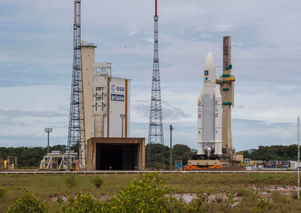 Two big rockets launched early Wednesday-then one landed in high seas