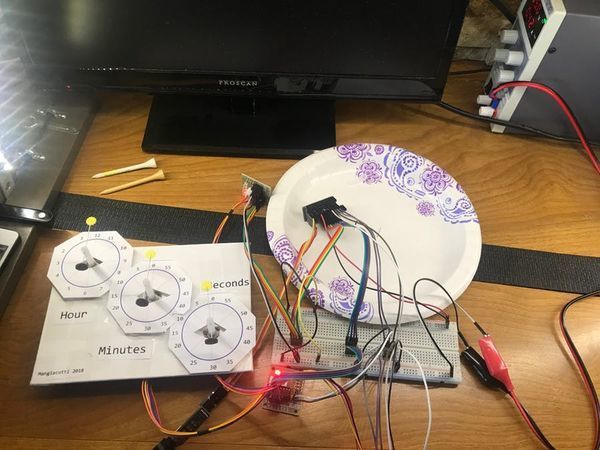 Backward Running Analog Clock with Three Steppers