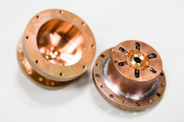 Questions in Quantum Computing: How to Move Electrons with Light