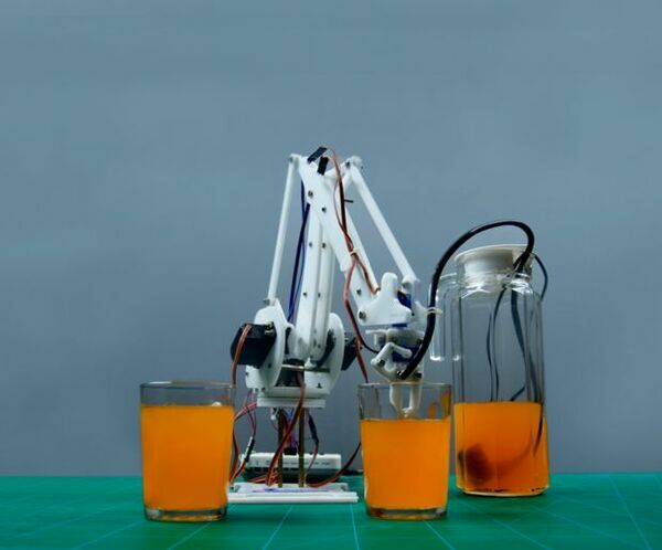 Automatic Robotic Arm Bartender Using Evive- Arduino Based Embedded Platform