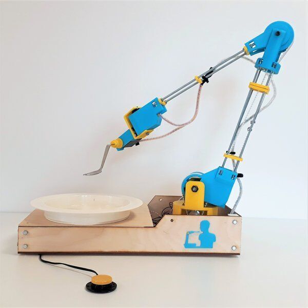 Open assistive robotic arm for meal