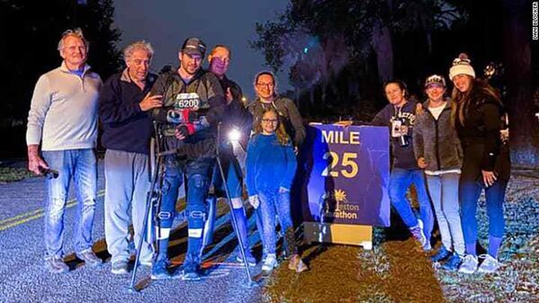 Paralyzed man breaks world record for finishing a marathon in an exoskeleton suit