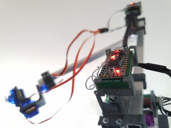 Robot Arm Built with Completely Re-made Servos