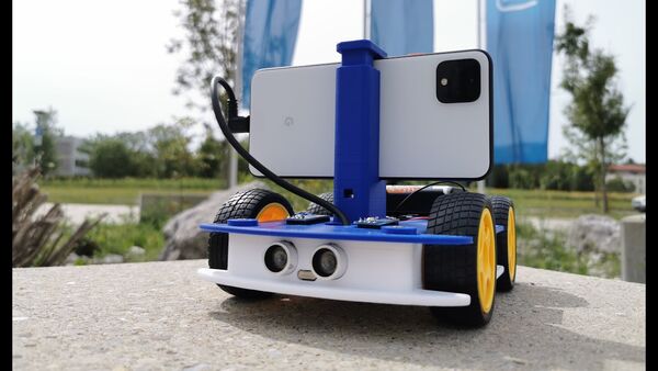 OpenBot: Turning Smartphones into Robots