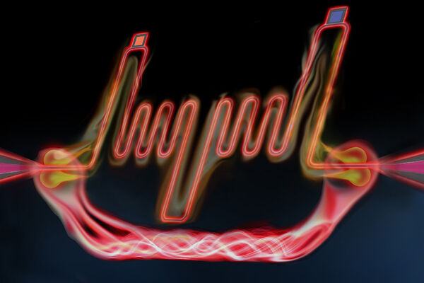Generating photons for communication in a quantum computing system
