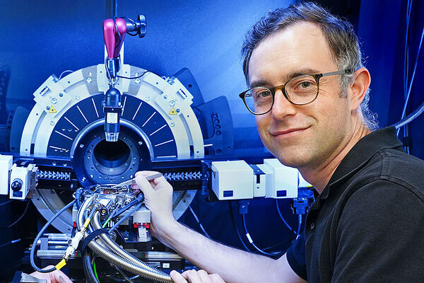 A New Approach for Studying Electric Charge Arrangements in a Superconductor