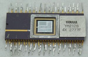 Reverse-engineering the Yamaha DX7 synthesizer's sound chip from die photos